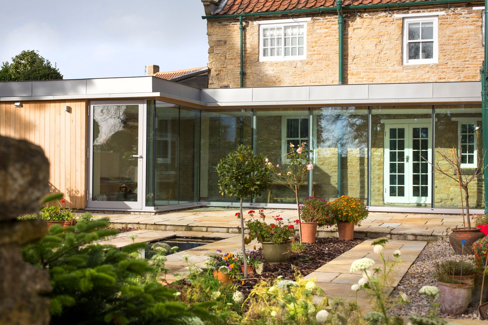 Church Lane Cottage, Hutton Buscel, Scarborough. Contemporary re-modelling and extension to Grade II listed cottage. Completion Photo