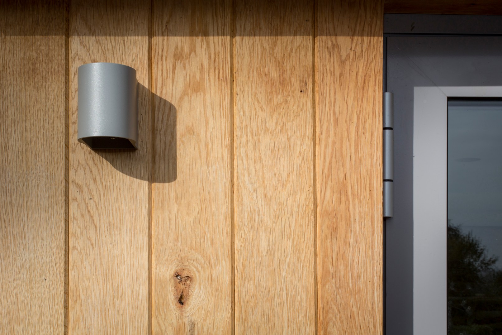 Church Lane Cottage, Hutton Buscel, Scarborough. Contemporary re-modelling and extension to Grade II listed cottage. Cladding & window detail