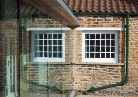 Church Lane Cottage, Hutton Buscel, Scarborough. Contemporary re-modelling and extension to Grade II listed cottage. External reflection