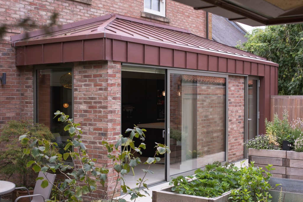 5 Church Lane, York. Contemporary rear extension & garden folly. View of rear extension from garden folly.